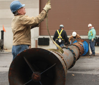 Vertical turbine pump being removed at Cornell University lake water pump station