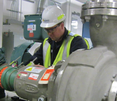 Siewert Service Technician performing laser alignment at University of Albany