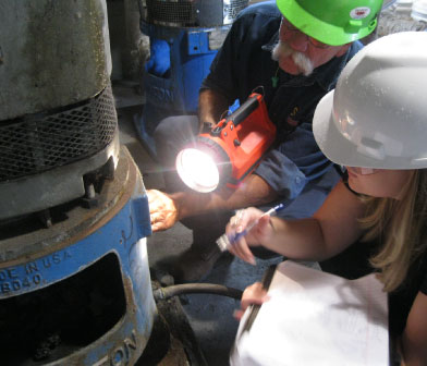 Siewert Equipment Pump Mechanic and Service Coordinator inspecting vertical turbine pump