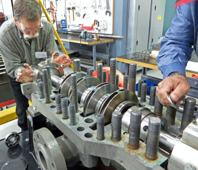 pump mechanic working on a high-pressure multi-stage split-case centrifugal pump