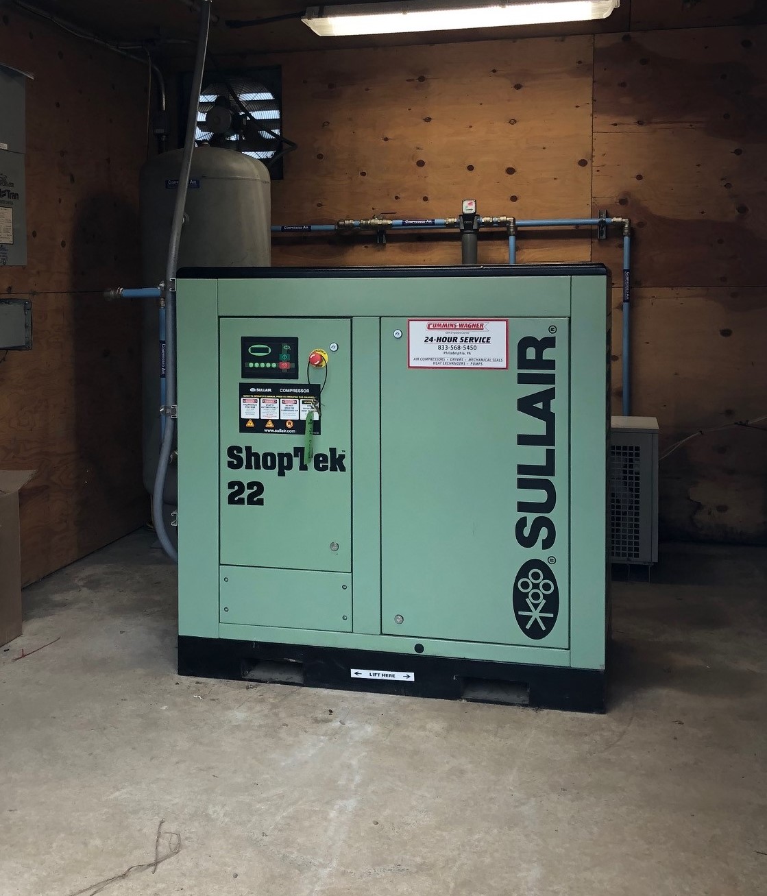 Relocation of compressed air equipment from one shed to another with a Sullair Shoptek compressor.