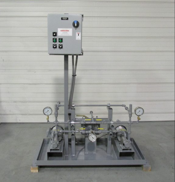 Duplex diesel fuel transfer package with manual motor control panel mounted on a painted steel base