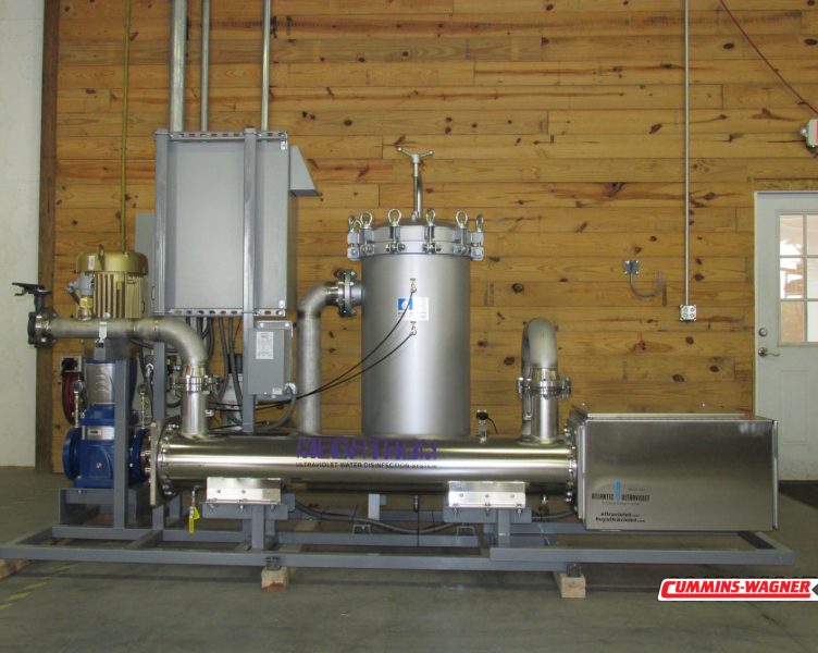 Back of Ultraviolet water treatment skid showing UV unit that disinfects water with germicidal lamps.