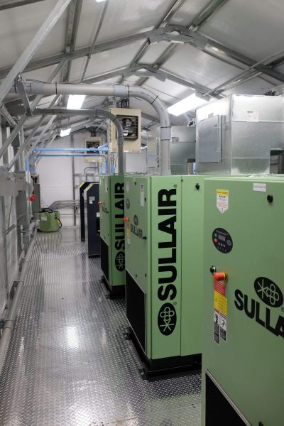 Sullair Compressors, wet tank, and air dryer in an insulated building package.